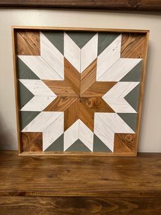 a wooden frame with an image of a star on it