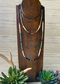 Part of our Native American Jewelry collection with black turquoise & rustic brown Heishi beads. These necklaces are beautiful together but bold enough as a single piece. Each necklace has an extender for the perfect length. Beads 5&6mm. Short necklace 22” -25” Long necklace 34”-37” Western Style Beaded Necklace, Making A Beaded Necklace, Heishi Bead Jewelry Ideas, Seed Bead Jewelry Necklaces, Heishi Bead Ideas, Native Beaded Jewelry, Native American Jewelry Diy, Wire Bead Jewelry, Western Beaded Necklace