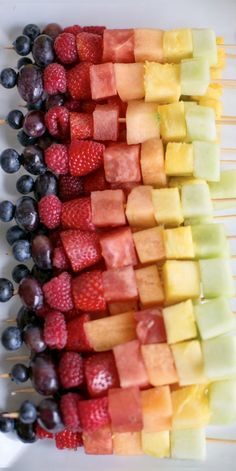 fruit salads or fruit canopies on skewers are ready to be eaten