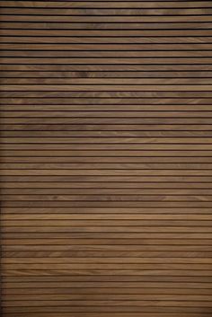 a wooden door with horizontal slats on it