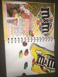 an open notebook with candy bar images on it