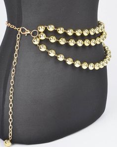 A sophisticated blend of elegance and style, the Multi Layered Bead Chain Belt is a statement accessory for any fashion-forward wardrobe. This exquisite piece features multiple layers of lustrous beads in your choice of goldstone or silver. Whether you're dressing up for a special occasion or adding a touch of glamour to your everyday outfit, this belt is sure to make a lasting impression. - 0.65" Wide x 47" Long - Imported Bead Chain, Scarf Gift, Chain Belt, Everyday Outfit, Beaded Chain, Multi Layering, Ring Necklace, Long Tops, Necklaces Bracelets