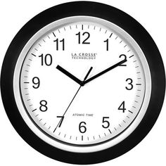 a black and white wall clock with the time at twelve o'clock on it