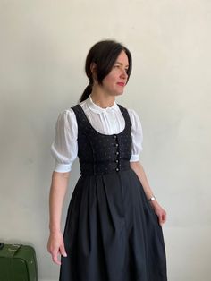 Amazing vintage black  dirndl midi   sleeveless  dress.  Great condition.  Composition: polyester.  ** Size 36(S) I am wearing size M and I am  170 cm height, it's a little bit small for me.  **This item will come to you freshly laundered and ready to wear. Styled Clothes, Bavarian Dress, German Folk, Folk Dress, Folk Dresses, Black Midi, Neoclassical, Midi Dress Sleeveless, Black Midi Dress