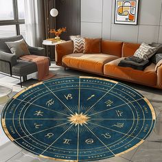 a living room filled with furniture and a large blue astro wheel rug on the floor