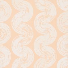 an orange and white wallpaper with swirls on the back in pastel colors