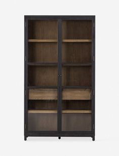 an open bookcase with wooden shelves and glass doors