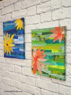 three colorful paintings on a white brick wall next to each other, one with an orange flower