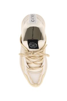 Eclypse sneakers byStella McCartney characterized by the sock-style upper in technical fabric with eco-suede details and trekking laces closure. Rear ribbon loop tab with contrasting jacquard logo, fabric logo label on the tongue, fabric lining and removable insole, rubber sole with debossed logo on the back. Spare laces included. Stella Mc, Fabric Logo, Makeup Travel Case, Sneaker Games, Logo Label, Fashion Socks, Beauty Accessories, Roberto Cavalli, Sneakers For Sale