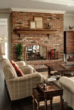 a living room filled with furniture and a fire place