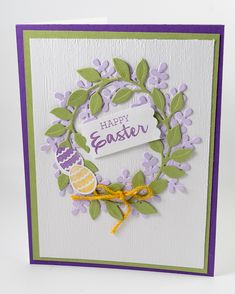 a handmade easter card with an egg and wreath