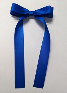 Royal Blue, Double Sided, Satin, Ribbon, Hair Bow - Long Style up for any Occasion! * Select Alligator Clip or Hair Tie * Size:     1in. wide ribbon     4in. wide bow     8in. long tails Each Bow is Made to Order Check out Instagram (link on Shop Page) for Updates! Thank you for visiting MyArtTimeCraftz! Royal Blue Hair Accessories, Blue Hair Ribbon, Blue Hair Bow, Blue Ribbon Bow, Royal Blue Aesthetic, Royal Blue Hair, Blue Hair Bows, Blue Hair Accessories, Ribbon Braids