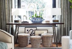 a table with baskets on it and the words from our style blog one kings lane