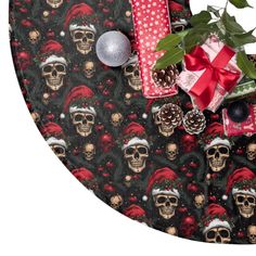 christmas wrapping with skulls and presents on it