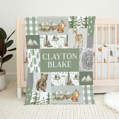 a baby crib with a blanket that says clayton blake on it