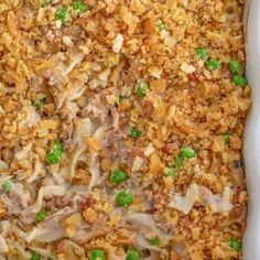 a casserole dish filled with meat and vegetables