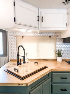 the kitchen counter is clean and ready to be used as a place for cooking or eating