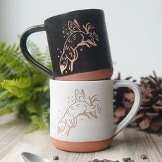 Do you believe in magic? Our Fox Faerie mug is for you! This engraved farmhouse-style mug features a whimsical leaping fox with antlers and faerie wings. This playful design will remind you to watch out for trickster fae creatures, while adding a touch of enchantment to your beverages. Fox symbolizes cleverness and good luck in many folk tales and mythology. Fox With Antlers, Fae Creatures, Faerie Wings, Custom Gift Cards, Brown Clay, Red Clay, Believe In Magic, Folk Tales, Do You Believe