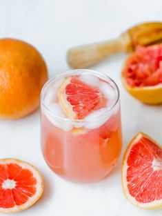 grapefruit and blood oranges on a white surface