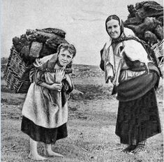 an old black and white photo of two women carrying baskets