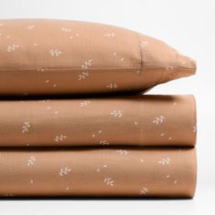 three pillows stacked on top of each other