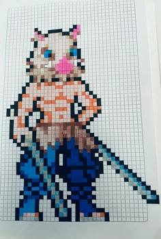 an image of a cat made out of pixelated squares on a sheet of paper