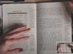 someone is reading a book with their hand on the page