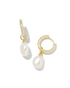 Classy and chic, we’re obsessed with the Willa Gold Pearl Huggie Earrings in White Pearl—and you will be, too! A dainty cultured freshwater pearl dangles from a petite huggie for a lightweight style you’ll pair back with any stack. Metal 14k Gold Over Brass Material White Pearl Closure Ear Post Size 1.8" Outside Diameter, 0.4"L X 0.3"W CharmDue to the one-of-a-kind nature of the medium, exact colors and patterns may vary slightly from the image shown. | Kendra Scott Willa Gold Huggie Earrings in Huggie Earrings Gold, Kendra Scott Earrings, Huggie Earrings