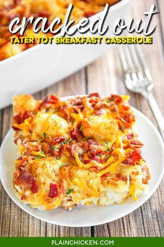 a white plate topped with breakfast casserole next to a bowl of baked potatoes