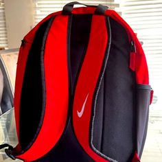 Nike Red Carry Backpack Brand New University Red Backpack For Everyday Use, Nike Student Backpack, Nike Standard Student Backpack, Sporty Red Everyday Bag, Red Rectangular Backpack For Back To School, University Red Everyday Backpack, Red Sports Backpack, Red Backpack For Students, Back To School, Red Standard Backpack For Sports