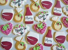 decorated cookies with wine and bride's gifts for the bride to be on display