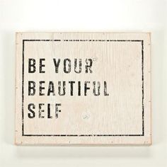 a sign that says be your beautiful self on the side of a white wall with black writing