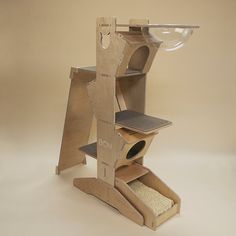 a wooden cat tree with a bowl on it's top shelf and shelves below