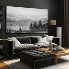 a living room filled with furniture and a painting on the wall