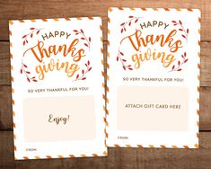 two thank cards with the words happy thanksgiving and an orange wreath on them, sitting next to each other