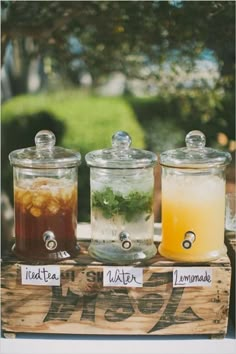 an image of the menu for a wedding with drinks in glass jars and labels on them