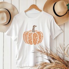 🎃 Halloween Pumpkin Shirt - Embrace the Fall Vibes in Style! 🍁 Get into the autumn spirit with our Halloween Pumpkin Shirt! This versatile tee combines comfort and style, making it the perfect addition to your fall wardrobe. Whether you're looking for a Halloween T-shirt, Retro Fall Shirt, or a thoughtful Gift for Teachers, this cute pumpkin-themed shirt is designed to bring cozy vibes to every occasion. 🧡 Why You'll Love This Shirt: ✅ Soft and Comfortable: Made from 100% ring-spun cotton for Autumn Spirit, Pumpkin Tshirt, Halloween Tshirt, Girls Fall Outfits, Pumpkin Theme, Pumpkin Shirt, Cozy Vibes, Fall Shirt, Cute Pumpkin