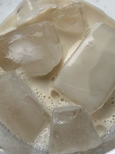 ice cubes and water in a glass container