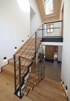 the stairs are made of metal and wood