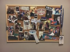 a bulletin board covered in pictures and magnets