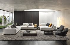 a modern living room with black and white furniture