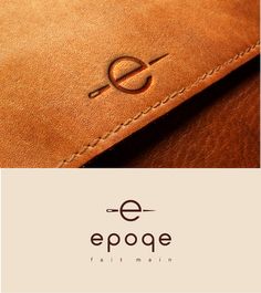 a brown leather bag with the word e - poge written in gold on it