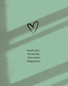 the shadow of a heart on a wall with a quote written below it that says small circle private life clear mind happy heart