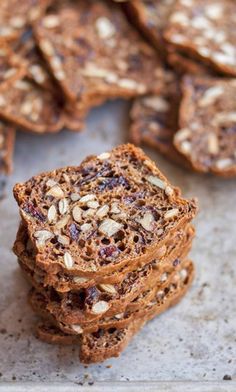 some brownies are stacked on top of each other with oats in the middle