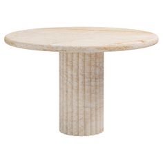 a round marble table with four columns on each side and one column at the end