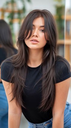 This hairstyle features long brunette layers with soft curtain bangs framing the face beautifully. The straight layers enhance the sleek, polished look while maintaining natural movement. Curtain Bangs With Black Hair, Face Shape Layers Long Hair, Long Layers Straightened, Long Layers And Long Bangs, Long Straight Haircut Side Part, Long Fine Brunette Hair, Face Framing Haircuts For Long Hair, 2025 Long Haircuts For Women, Long Round Face Haircut