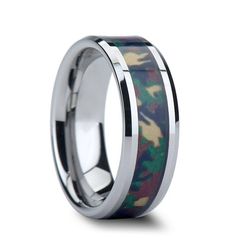 a wedding ring with camouflage inlaying the center