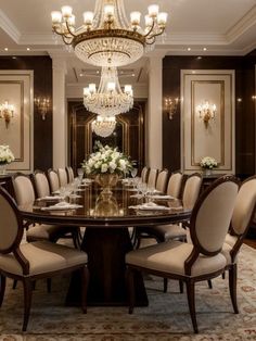 an elegant dining room with chandelier and table set for eight, surrounded by beige upholstered chairs