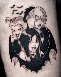 an image of some people on the thigh with bats and bats around them, all in black