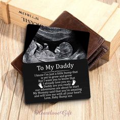 a card with an image of a baby's diaper and the words to my daddy on it